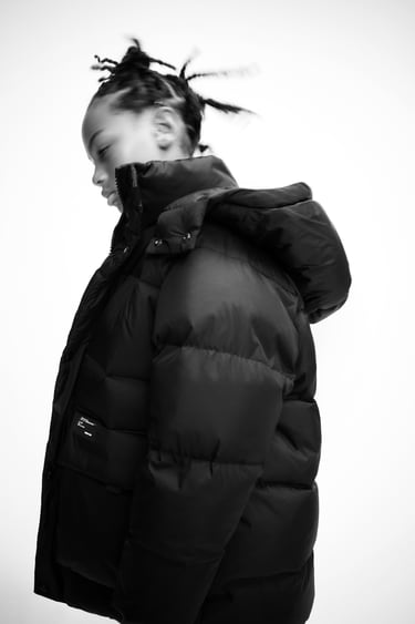 Image 0 of DOWN AND FEATHER PUFFER JACKET WITH MAXI POCKETS from Zara