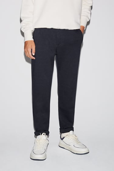 Image 0 of TROUSERS WITH RIBBED AND STRIPE WAIST DETAIL from Zara