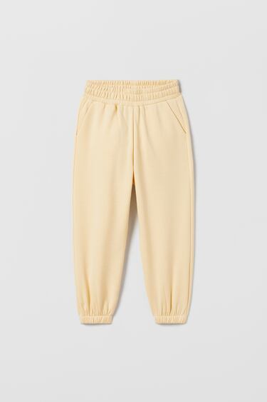 Afbeelding 0 van Velours jogger-broek met elastische tailleband. Zakken aan de voorkant. Pijpboorden. van Zara