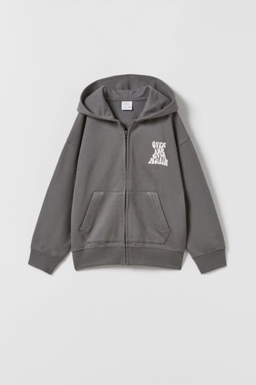 Image 0 of PLUSH HOODIE WITH SLOGAN from Zara
