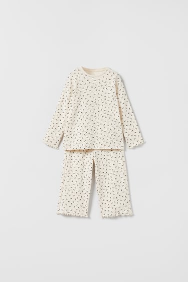 Image 0 of BABY/ OPEN KNIT FLORAL PYJAMAS from Zara