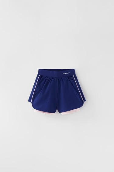 SPORTY BERMUDA SHORTS WITH CONTRAST PIPING