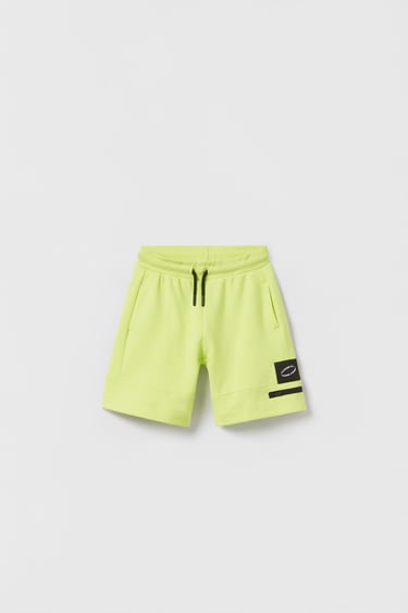 SPORTY BERMUDA SHORTS WITH LABEL