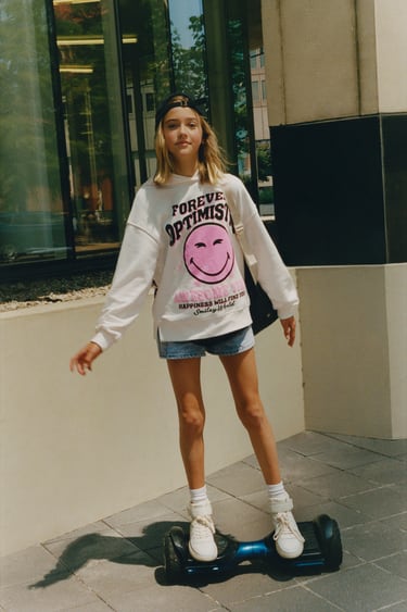 Image 0 of NEON SMILEYWORLD ® HAPPY COLLECTION HOODIE from Zara
