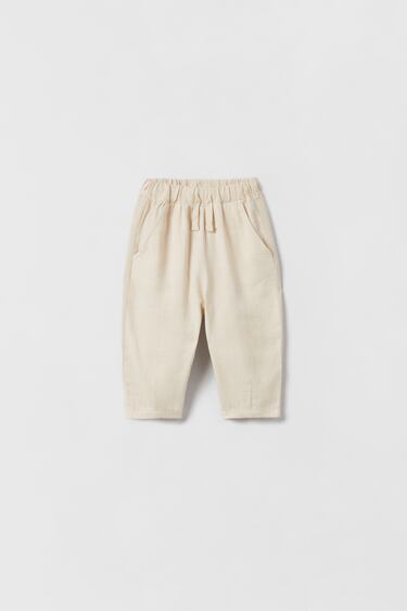 Image 0 of CONTRASTING TROUSERS from Zara