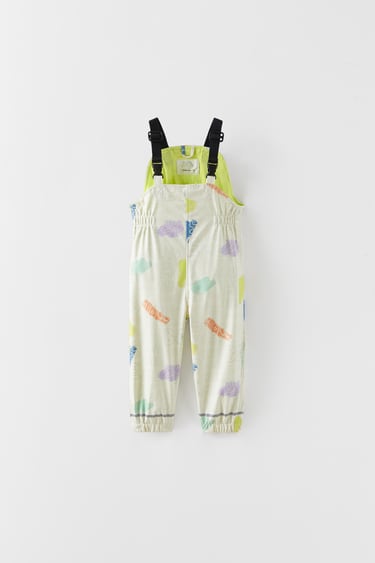 Image 0 of PRINTED RUBBERISED DUNGAREES from Zara