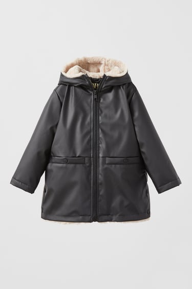 Image 0 of RUBBERISED RAINCOAT WITH FAUX FUR LINING from Zara