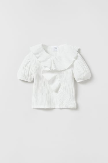 Image 0 of TEXTURED T-SHIRT WITH FRAYED TRIMS from Zara
