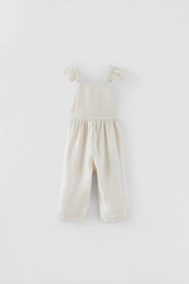 Image 0 of RUFFLED LINEN JUMPSUIT from Zara