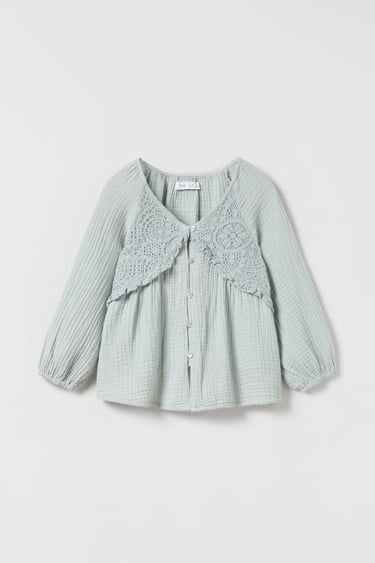Image 0 of TEXTURED BLOND LACE BLOUSE from Zara