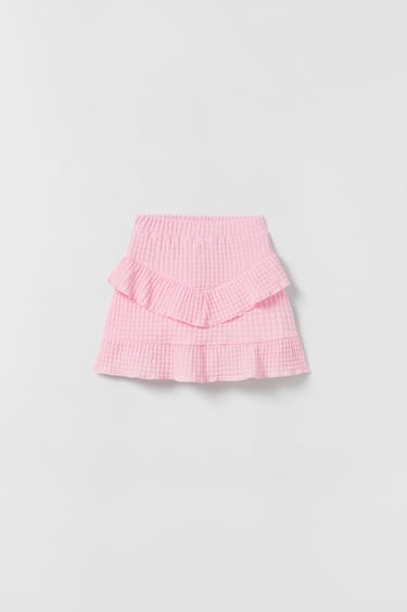 TEXTURED SKIRT WITH RUFFLE TRIMS