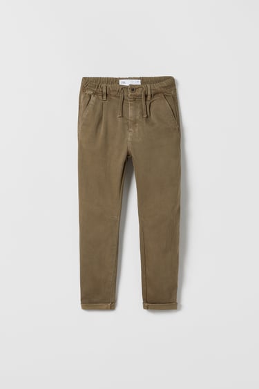 Image 0 of DARTED SUPER ELASTIC TROUSERS from Zara