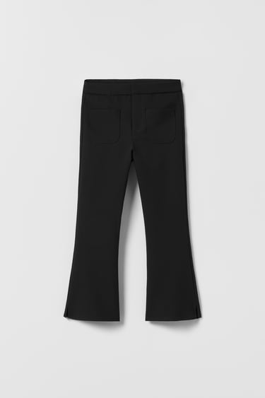 FLARED TROUSERS WITH POCKETS