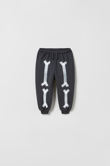 Image 0 of EMBOSSED BONE TROUSERS from Zara