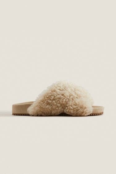 Image 0 of Faux fur crossover sandals from Zara