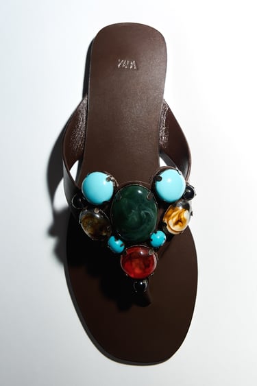 Image 0 of FLAT LEATHER SLIDER SANDALS WITH STONE BEADS from Zara