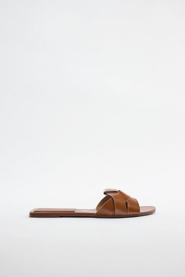 Image 0 of FLAT CRISS-CROSS LEATHER SLIDER SANDALS from Zara
