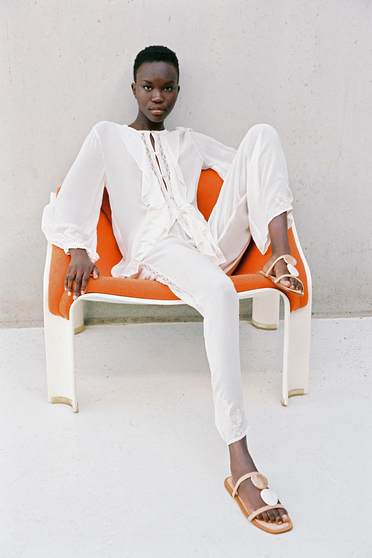 Zara Ecru flat 100% Leather sandals with elegant thin straps, featuring an applique precious looking stone bead detail down the front. Square toe.