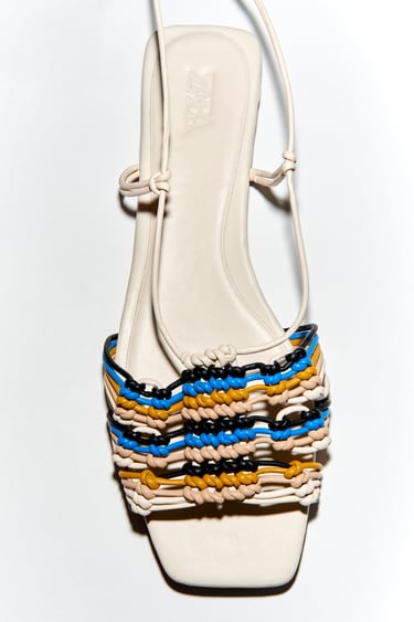 Image 0 of LACE UP WOVEN FLAT SANDALS from Zara