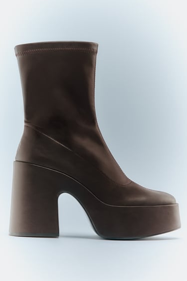 Image 0 of PLATFORM HEELED ANKLE BOOTS from Zara