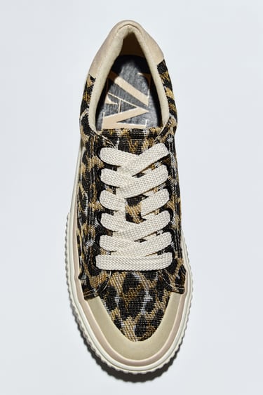 Image 0 of ANIMAL PRINT TRAINERS from Zara