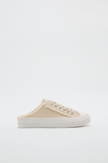 Image 0 of MULE TRAINERS from Zara