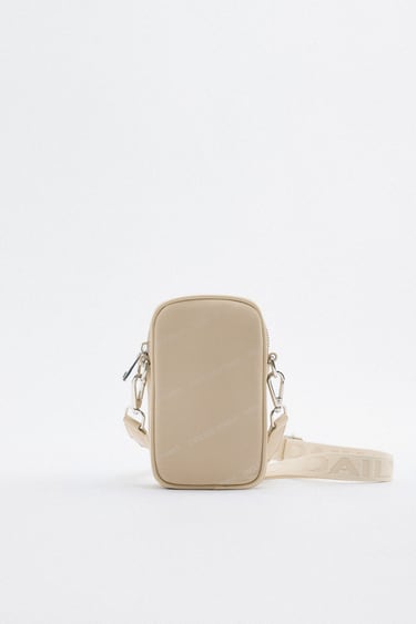 Image 0 of NYLON MOBILE PHONE BAG WITH SLOGAN DETAIL from Zara