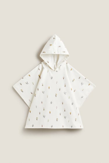 Image 0 of PEANUTS™ PRINTED PONCHO from Zara