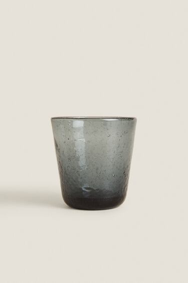 Image 0 of GLASS TUMBLER WITH IRREGULAR DESIGN from Zara
