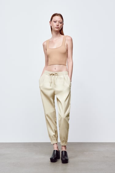 Image 0 of FAUX LEATHER JOGGING TROUSERS from Zara