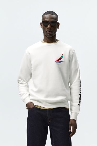 Image 0 of CONTRASTING EMBROIDERED SWEATSHIRT from Zara