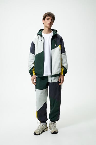 Image 0 of COLOUR BLOCK TECHNICAL TROUSERS from Zara
