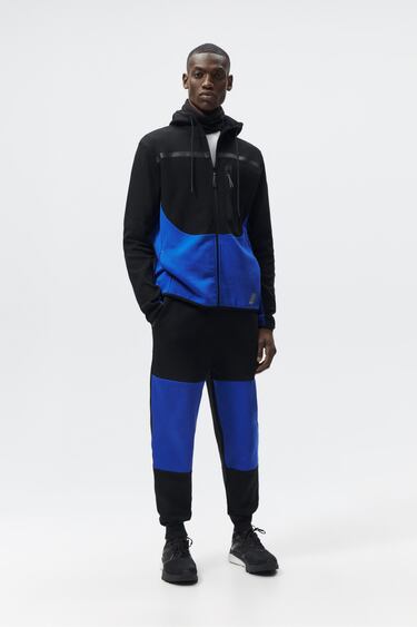 Image 0 of COLOUR BLOCK HOODED JACKET from Zara