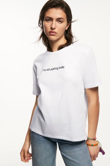 T-SHIRT WITH EMBROIDERED SLOGAN