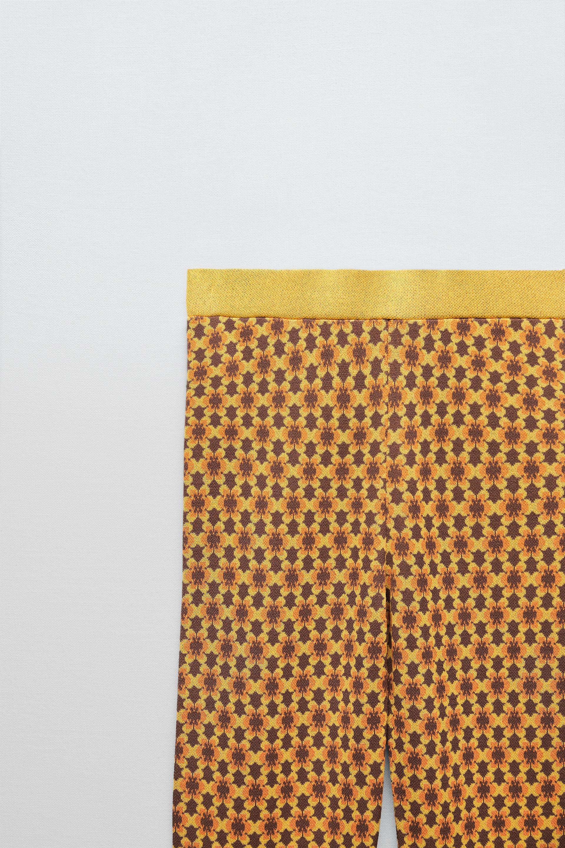 GEOMETRIC JACQUARD MINI FLARE TROUSERS 
