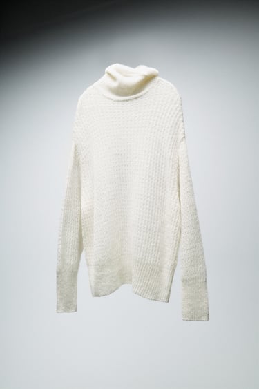 PULL OVERSIZE EN MAILLE POINTELLE LIMITED EDITION