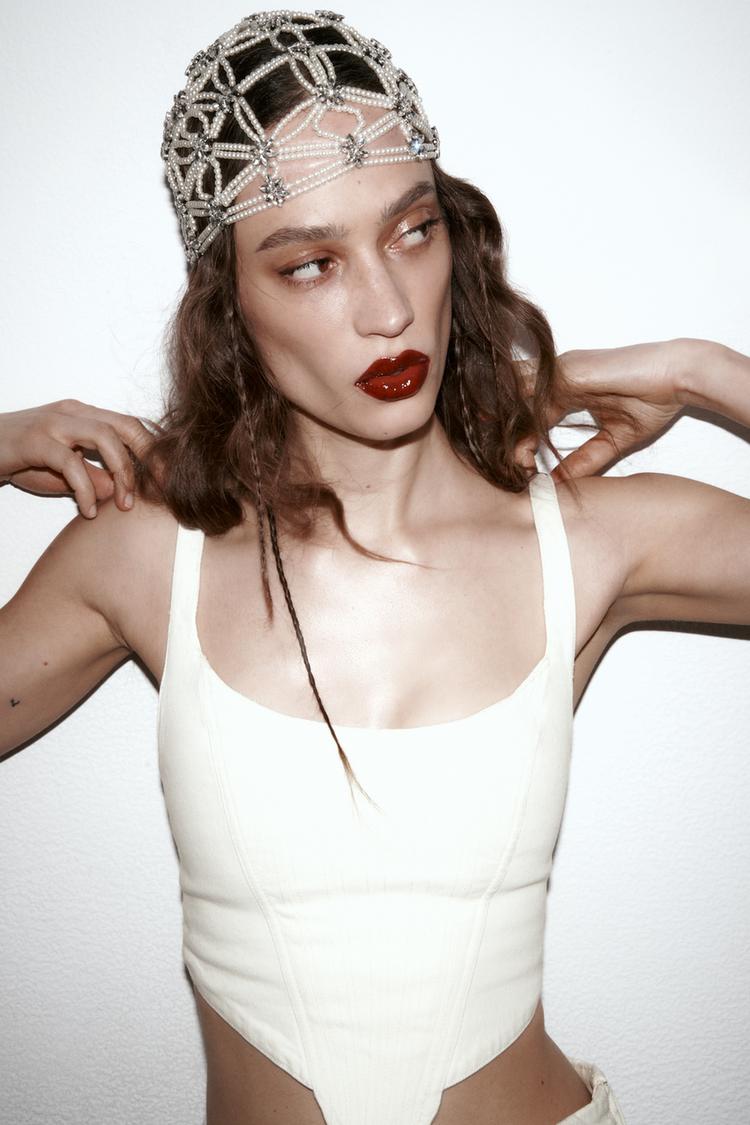 Image 0 of FAUX PEARL AND RHINESTONE CAP from Zara