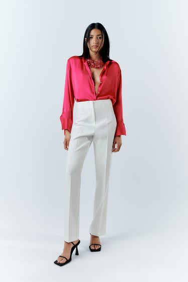 HIGH-RISE FLARED TROUSERS