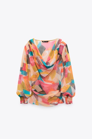 PRINTED BLOUSE WITH FLOWING NECKLINE