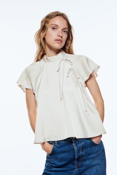 FLOWY TOP WITH BOWS