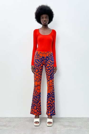 PRINTED FLARED TROUSERS