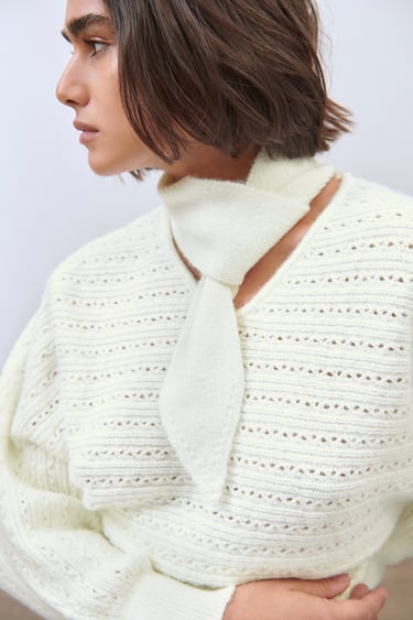 KNIT SWEATER WITH TIED NECK