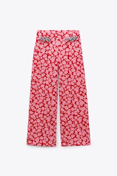 TROUSERS WITH FLOWER-SHAPED RHINESTONES