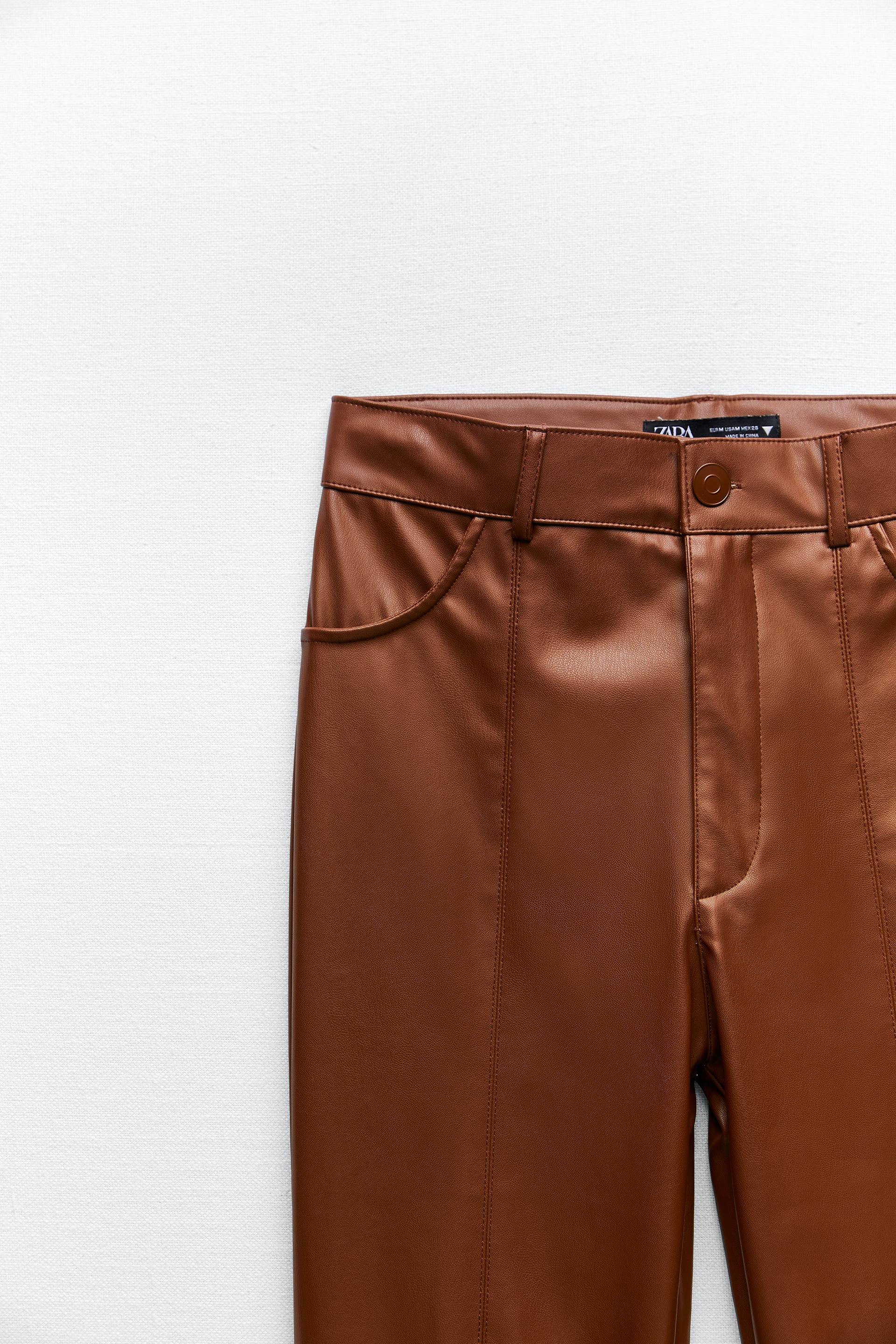 FAUX LEATHER TROUSERS WITH SLITS 