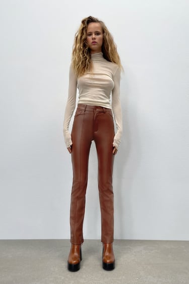 FAUX LEATHER PANTS WITH SLIT
