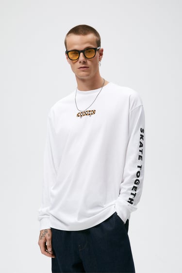Image 0 of CONTRAST SLOGAN T-SHIRT from Zara