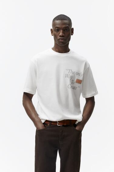 Image 0 of T-SHIRT WITH SLOGAN PRINT from Zara