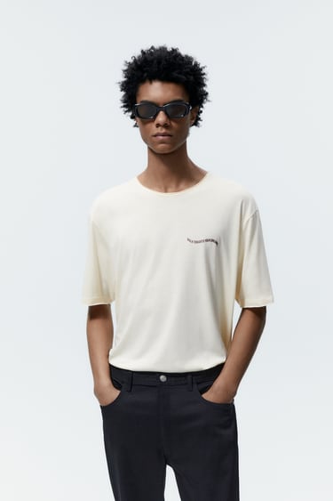 Image 0 of T-SHIRT WITH SLOGAN PRINT from Zara