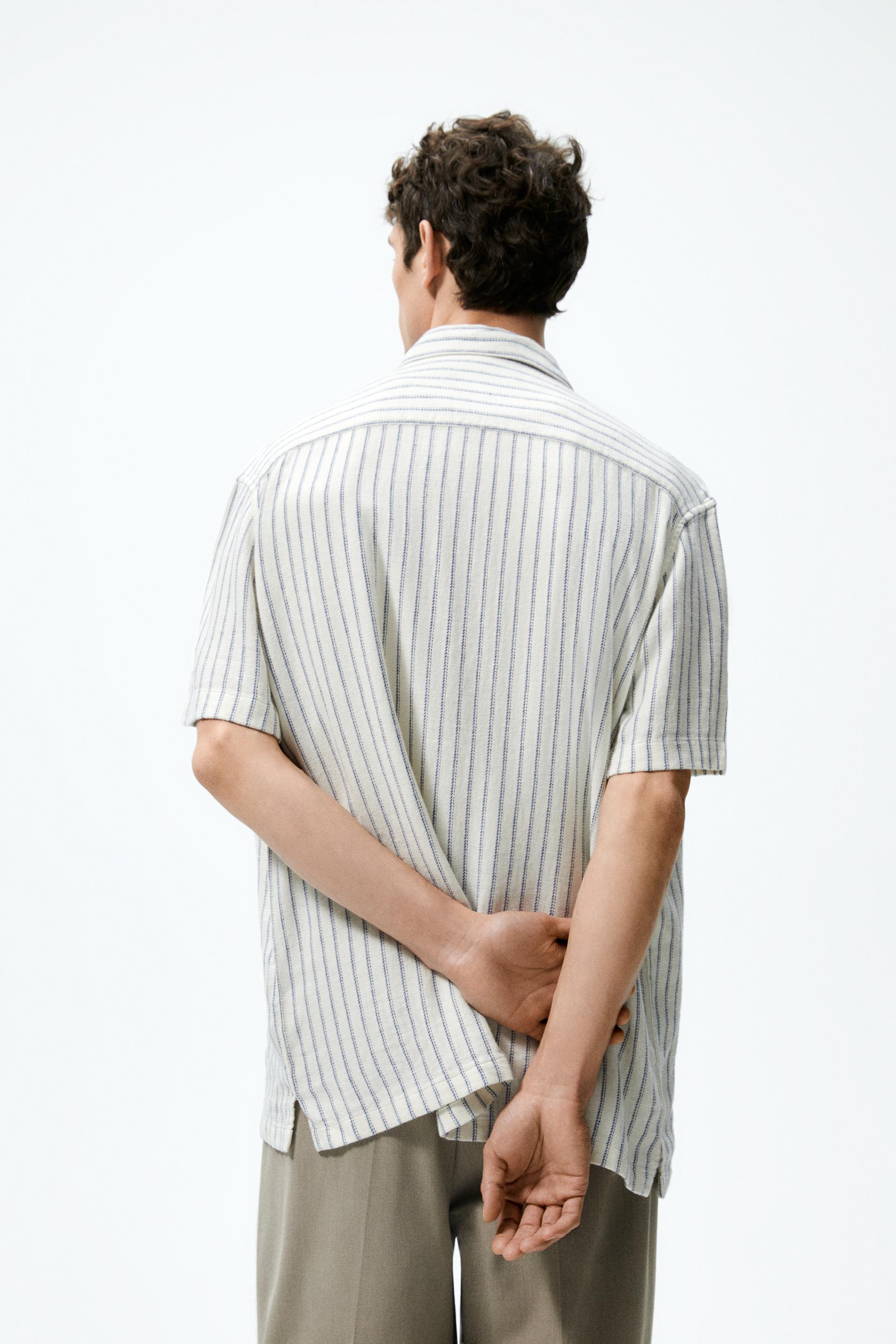 beige and white striped shirt