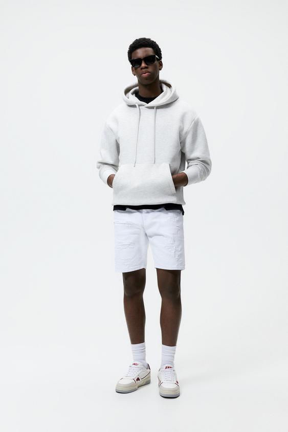 white ripped denim shorts mens